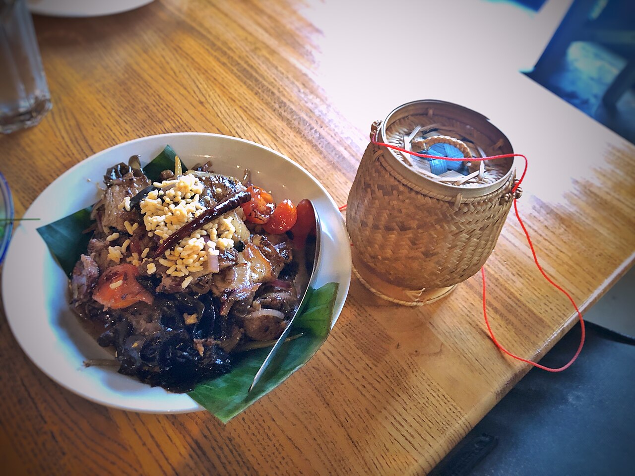 UU SOM- rice-cured sour pork belly, makrut lime, ginger, garlic, tomato, wood ear, toasted chili, puffed rice.jpg