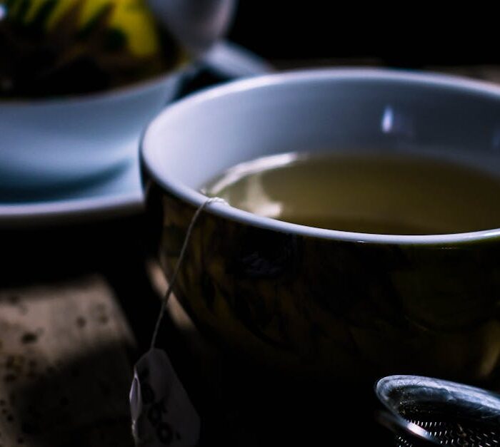 Hot green tea in a cup